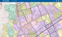 ピンク、黄色、緑に色分けされた地形図